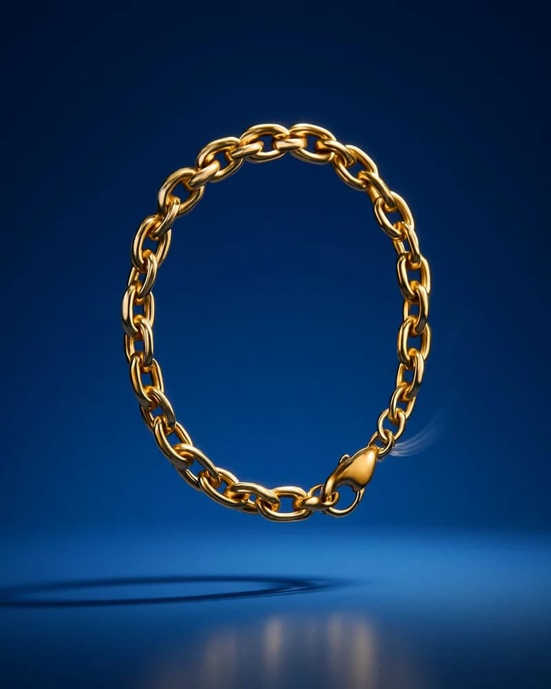 A heavy solid yellow gold curb chain bracelet with a heart clasp.
